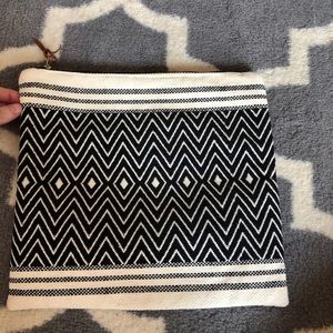 Tribe Alive fold over clutch